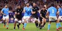 Manuel Leindekar of Uruguay offloads the ball during his team's Rugby World Cup match against New Zealand at Parc Olympique on 5 October, 2023 in Lyon, France. (Photo: Paul Harding/Getty Images)