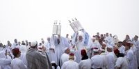 Members of the Samaritan community attend a religious service marking the end of their Passover holiday atop Mount Gerizim, above the West Bank city of Nablus, 29 April 2024. According to tradition, the Samaritans are descendants of the Jews who were not deported when the Assyrians conquered Israel in 722 BC. The small community numbers about 810 people, half of them live in a village at Mount Gerizim, near the Palestinian city of Nablus, and the rest in Holon near Tel Aviv in Israel. Nablus, and the rest in Holon near Tel Aviv in Israel.  EPA-EFE/ATEF SAFADI