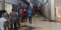 Throngs of people queue to go into Shoprite in Protea gardens on the morning Protea Gardens. (Photo: Bheki Simelane)