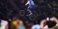 TOKYO, JAPAN - AUGUST 08: A BMX rider performs during the Closing Ceremony of the Tokyo 2020 Olympic Games at Olympic Stadium on August 08, 2021 in Tokyo, Japan. (Photo by Ezra Shaw/Getty Images)