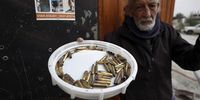 epaselect epa10450705 A palestinian holds empty bullet shells at the scene of a gunfight after an Israeli army raid near the West Bank city of Jericho, 06 February 2023. The Israeli army reported that a number of armed assailants, suspected to be involved in the 28 January attack at the Almog Junction, were killed after firing toward Israeli soldiers who were operating in the area.  EPA-EFE/ATEF SAFADI