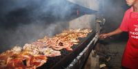 Mzoli's has become so popular that there are several braaiing stations now. Photo supplied.