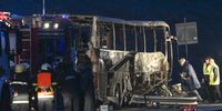 epa09598488 Fire fighters, police officers and investigators inspect the wreckage of a bus with North Macedonian plates that caught fire on a highway, killing at least 45 people, near the village of Bosnek, Bulgaria, 23 November 2021.  EPA-EFE/VASSIL DONEV