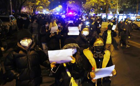 China tightens security after rare protests against Covid-19 curbs