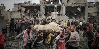 Residents and civil defence teams rescue a Palestinian person from the rubble of a building that collapsed following an Israeli attack in Khan Yunis, Gaza on 7 December  2023. (Photo: Belal Khaled / Anadolu / Anadolu via AFP)