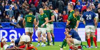 Springboks celebrate winning the 2023 Rugby World Cup quarterfinal  while dejected French players sink to the ground. (Photo: RvS.Media / Sylvie Failletaz / Getty Images)