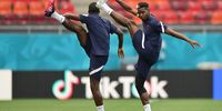 BUCHAREST, ROMANIA - JUNE 27: Paul Pogba of France stretches during the France Training Session ahead of the UEFA Euro 2020 Round of 16 match between France and Switzerland at National Arena on June 27, 2021 in Bucharest, Romania. (Photo by Justin Setterfield/Getty Images)