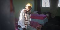 An old man sits on his bed. Older individuals benefit from increased mental health if they socialise with like-minded people. (Photo: Shiraaz Mohamed)
