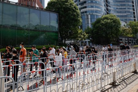 Beijing steps up Covid-19 curbs as virus spreads in China