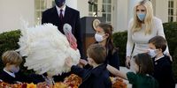 WASHINGTON, DC - NOVEMBER 24: Jared Kushner (L) and Ivanka Trump, both senior advisors to her father U.S. President Donald Trump, and their children pet the national Thanksgiving Turkey after it was pardoned during a traditional ceremony in the Rose Garden of the White House November 24, 2020 in Washington, DC. The turkey pardon was made official in 1989 under former President George H.W. Bush, who was continuing an informal tradition started by President Harry Truman in 1947. (Photo by Chip Somodevilla/Getty Images)