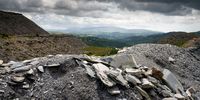 BLAENAU FFESTINIOG, WALES - JULY 29: Mountains of slate create the landscape near the disused Maenofferen Slate Quarry on July 29, 2021 in Blaenau Ffestiniog, United Kingdom. The North West Wales Slate Landscape has been granted UNESCO World Heritage Status, along side places such as Venice and the Great Wall of China and is 32nd site in UK to get the heritage status The area famous for its slate mining around Blaenau Ffestiniog, Llanberis, Bethesda and the Nantlle Valley  has provided slate for  many buildings around the world. (Photo by Christopher Furlong/Getty Images)