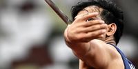 epaselect epa09403714 Neeraj Chopra of India competes the Men's Javelin Throw final during the Athletics events of the Tokyo 2020 Olympic Games at the Olympic Stadium in Tokyo, Japan, 07 August 2021.  EPA-EFE/CHRISTIAN BRUNA