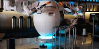 A two-armed robot called "ADAM" prepares a cup of coffee for a customer at Botbar coffee shop on May 31, 2023 in the Brooklyn borough of New York City. The robot barista at Botbar, which has launched a soft opening in the Greenpoint neighborhood, is expected to make up to 50 espresso drinks an hour when the shop fully opens. The coffee shop is a client of Richtech Robotics, a robotics manufacturer based in Las Vegas and is the first such store in New York City.  (Photo by Spencer Platt/Getty Images)