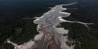 A drone image of what is left of the river in the community of Tumbira, in the Río Negro Sustainable Development Reserve in Iranduba, Brazil, 07 October 2023 (issued 08 October 2023). The severe drought in the Brazilian Amazon has isolated entire villages that depend on the rivers for a sustainable livelihood and are now watching with concern as the water disappears under their feet: 'Something abnormal is happening'. The community of Tumbira is about 75 kilometers from Manaus, capital of the state of Amazonas, and is home to some 30 families whose income comes mainly from tourism.  EPA-EFE/Raphael Alves