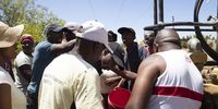 Residents filling in water into the buckets started fighting at one of the tankers in Hammanskraal as people were desperate to get water from the tanker before it finished.