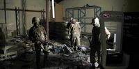 Members of the South African National Defence Force (SANDF) patrol damaged shops in KwaDabeka, Durban, after several supermarkets were looted on 30 June 2026,(Photo: Felix Dlangamandla)