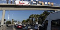 A protest on the Taliep Petersen Bridge on Nelson Mandela Boulevard in Cape Town on Monday against live animal export and the  cattle ship in Cape Town Harbour on 19 February 2024. (Photo: Gallo Images / ER Lombard)