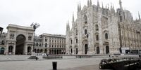 epa08288172 View of an empty Duomo square during the coronavirus emergency lockdown in Milan, Italy, 12 March 2020. The World Health Organization (WHO) officially declared the coronavirus outbreak a pandemic on 11 March 2020.  EPA-EFE/MOURAD BALTI TOUATI