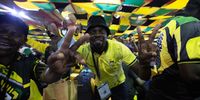 Pro-Ramaphosa delegates celebrate his second term at the ANC's 55th national conference at Nasrec in Johannesburg, South Africa on 19 December 2022. (Photo: Leila Dougan)