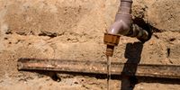 A running tap in Hammanskraal, where there is an ongoing water crisis. (Photo: Julia Evans)