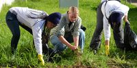 Volunteers clean up the garden at the Gelvandale High School hostel. (Photo: Deon Ferreira)