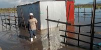 This photo shows how deep the water is around Nyathi’s home. (Photo: Vincent Lali)