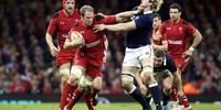 Alun Wyn Jones (L) of Wales fends off Richie Gray of Scotland during the RBS Six Nations rugby union match between Wales and Scotland at the Millennium Stadium in Cardiff, Britain, 15 March 2014.  EPA/DAVID JONES