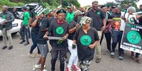 Supporters of MK senior leader Visvin Reddy gathered outside the Chatsworth Magistrate court on 3 April 2024 where he appeared on charges of inciting public violence. (Photo: Chris Makhaye)