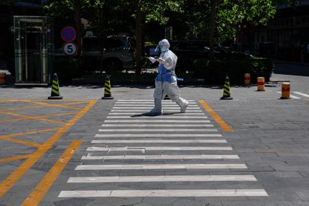 Tightening Covid-19 net, Beijing issues punishments and stark warnings