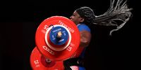 TOKYO, JAPAN - AUGUST 02: Gaelle Nayo Ketchanke of Team France competes during the Weightlifting - Women's 87kg Group A on day ten of the Tokyo 2020 Olympic Games at Tokyo International Forum on August 02, 2021 in Tokyo, Japan. (Photo by Chris Graythen/Getty Images)