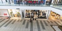 A wide angle image as EFF members protest outside a shut Clicks store in Menlyn Mall, Pretoria. The protest entered into its second day. The EFF shut down the store on Monday 7 September as part of a nationwide protest against Clicks. (Photo: Shiraaz Mohamed)