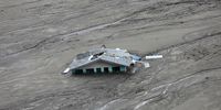 A mud-covered house after the cloudburst at Dharali village in Uttarkashi district, Uttarakhand state, northern India, 11 August 2025. Uttarakhand State Disaster Management Authority confirmed that over 1000 people have been rescued since a powerful cloudburst struck the Dharali area in the Uttarkashi district on 05 August, triggering flash floods that swept away a village and left several people dead.  EPA/RAJAT GUPTA