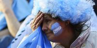 A supporter of Argentina reacts while watching the broadcast of the FIFA World Cup 2018 group D preliminary round soccer match between Argentina and Croatia in Buenos Aires, Argentina, 21 June 2018. Croatia won 3-0.  EPA-EFE/DAVID FERNANDEZ