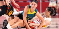 SAITAMA, JAPAN - JULY 30: Katie Ebzery #10 of Team Australia and Siyu Wang #5 of Team China fight for possession of the ball in a scrum during the first half of a Women's Basketball Preliminary Round Group C game on day seven of the Tokyo 2020 Olympic Games at Saitama Super Arena on July 30, 2021 in Saitama, Japan. (Photo by Gregory Shamus/Getty Images)