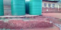 The tanks at Ga-Ratseke Primary School. The principal say they regularly spends R900 to fill one tank with water. It lasts a week. (Photo: Ezekiel Kekana)
