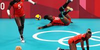 TOKYO, JAPAN - JULY 27: Edith Mukuvilani #19 of Team Kenya falls against Team South Korea during the Women's Preliminary - Pool A volleyball on day four of the Tokyo 2020 Olympic Games at Ariake Arena on July 27, 2021 in Tokyo, Japan. (Photo by Toru Hanai/Getty Images)