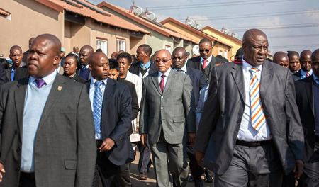 Zuma plays statesman as South Africa remembers the grand old man