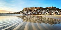 Reflections on Fishhoek beach. Photographer: Wendy Hogarth