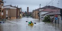 A citizen with an inflatable kayak goes back and forth between the flooded houses to bring some people stuck in the house to dry land, in Cesena, Italy, 17 May 2023. A fresh wave of torrential rain is battering Italy, especially the northeastern region of Emilia-Romagna and other parts of the Adriatic coast.  EPA-EFE/MAX CAVALLARI