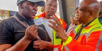 Mayor Dada Morero hands over an informal trading permit at Noord Street Market, Johannesburg, on 24 October. (Photo: Sharon Seretlo / Gallo Images)