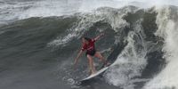 ICHINOMIYA, JAPAN - JULY 27: Bianca Buitendag of Team South Africa surfs during the Gold Medal match against Carissa Moore of Team United States  on day four of the Tokyo 2020 Olympic Games at Tsurigasaki Surfing Beach on July 27, 2021 in Ichinomiya, Chiba, Japan. (Photo by Ryan Pierse/Getty Images)