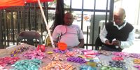 Phillimon Makula (28) sells his assorted sweets on Kirk Street, outside Limpopo Mall on 17 April 2019. Photo: Nkateko Mabasa