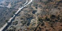 Gouges in the earth act as spoor of illegal  chrome mining