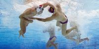 Daniel Angyal of Team Hungary and Roger Tahull Compte of Team Spain tussle during the Men’s Bronze Medal match between Hungary and Spain on day sixteen of the Tokyo 2020 Olympic Games at Tatsumi Water Polo Centre on August 08, 2021 in Tokyo, Japan. (Photo by Tom Pennington/Getty Images)