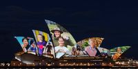 SYDNEY, AUSTRALIA - OCTOBER 18: Images of the pandemic are projected onto the Sydney Opera House on October 18, 2021 in Sydney, Australia. The projections on the famous Sydney Opera House sails are in tribute to frontline workers and vaccinated residents of New South Wales after the state passed the 80 per cent vaccination milestone. (Photo by Brook Mitchell/Getty Images)
