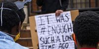‘It was enough such a long time ago’ reads a poster at an anti-gender-based violence march last Women’s Month, 29 August 2020. (Photo: Julia Evans)