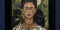 Installation view of Frida Kahlo, Self Portrait with Hummingbird and<br>Thorn Necklace (1940). Collection Harry Ransom Center, The University<br>of Texas at Austin, Nickolas Muray Collection of Modern Mexican Art. ©<br>Banco de México Diego Rivera & Frida Kahlo Museums Trust. Photo<br>Graham De Lacy