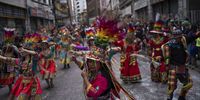 People participate in the Mil Tambores 2023 carnival where more than 100 groups from Chile and other countries gathered in Valparaiso, Chile, 01 October 2023.  EPA-EFE/ADRIANA THOMASA