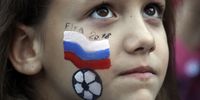 A Russian fan in the Fan Fest area in St Petersbug, Russia 25 June 2018, watching the FIFA World Cup 2018 group A game between Russia and Uruguay.  EPA-EFE/ETIENNE LAURENT