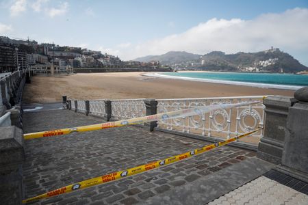 Spain hunkers down as government orders strict limits on public life